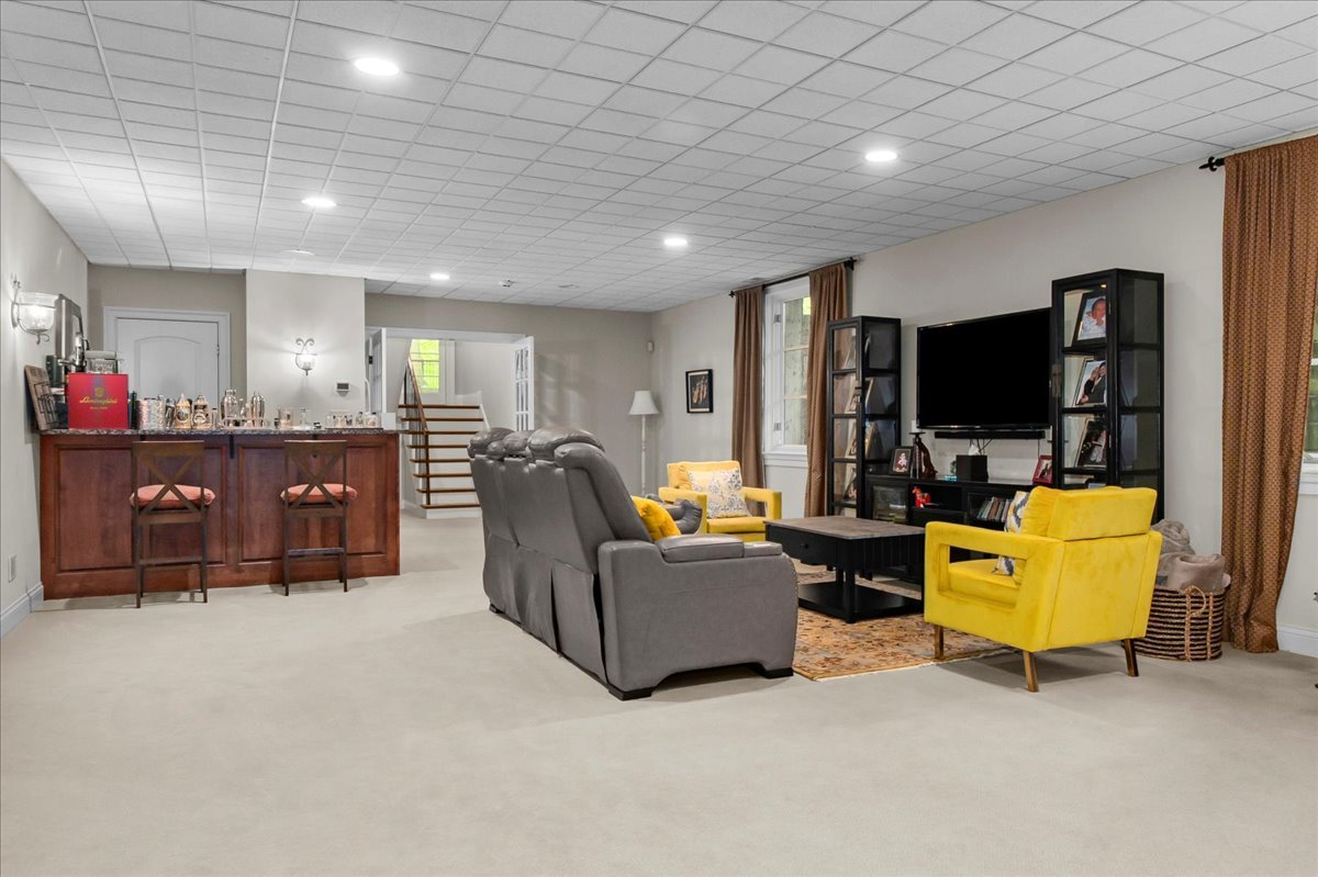 697 Bluff Road Lake Bluff, IL 60044 - Photo 37 of 47 a living room with furniture and a flat screen tv