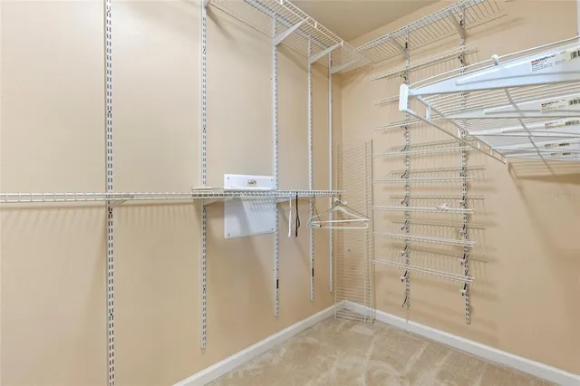 a bathroom with a glass door shower