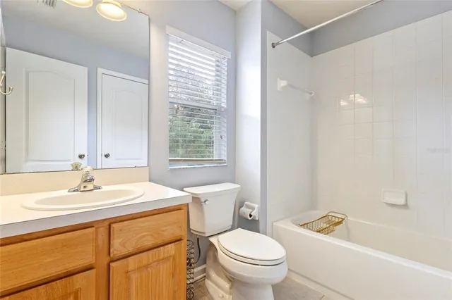 a bathroom with a sink a toilet and a bathtub