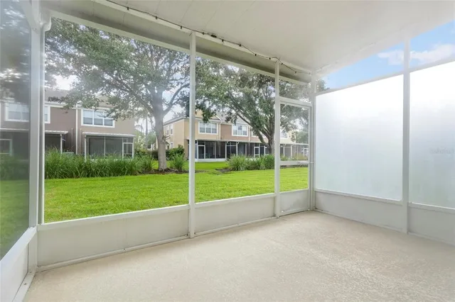 a view of a pathway with a yard