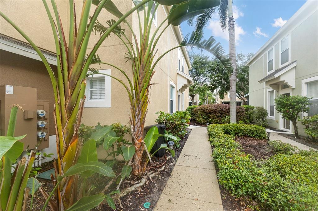 8324 72nd Lane East Bradenton, FL 34201 - Photo 36 of 50 a view of a pathway with a yard