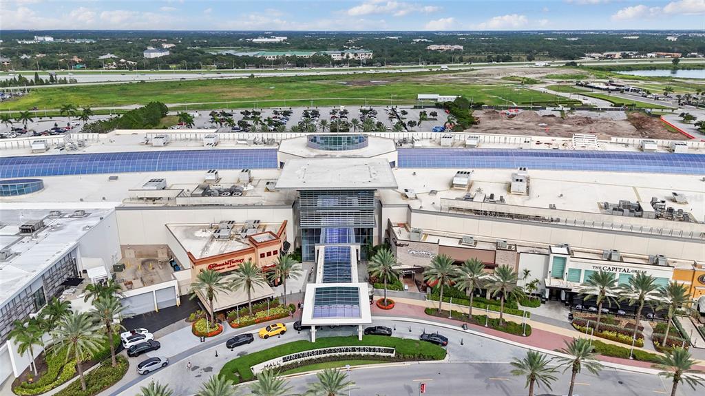 8324 72nd Lane East Bradenton, FL 34201 - Photo 46 of 50 a view of a city with lawn chairs