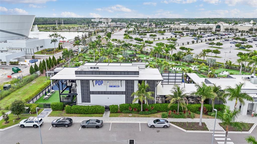 8324 72nd Lane East Bradenton, FL 34201 - Photo 49 of 50 an aerial view of a house with a garden and street view