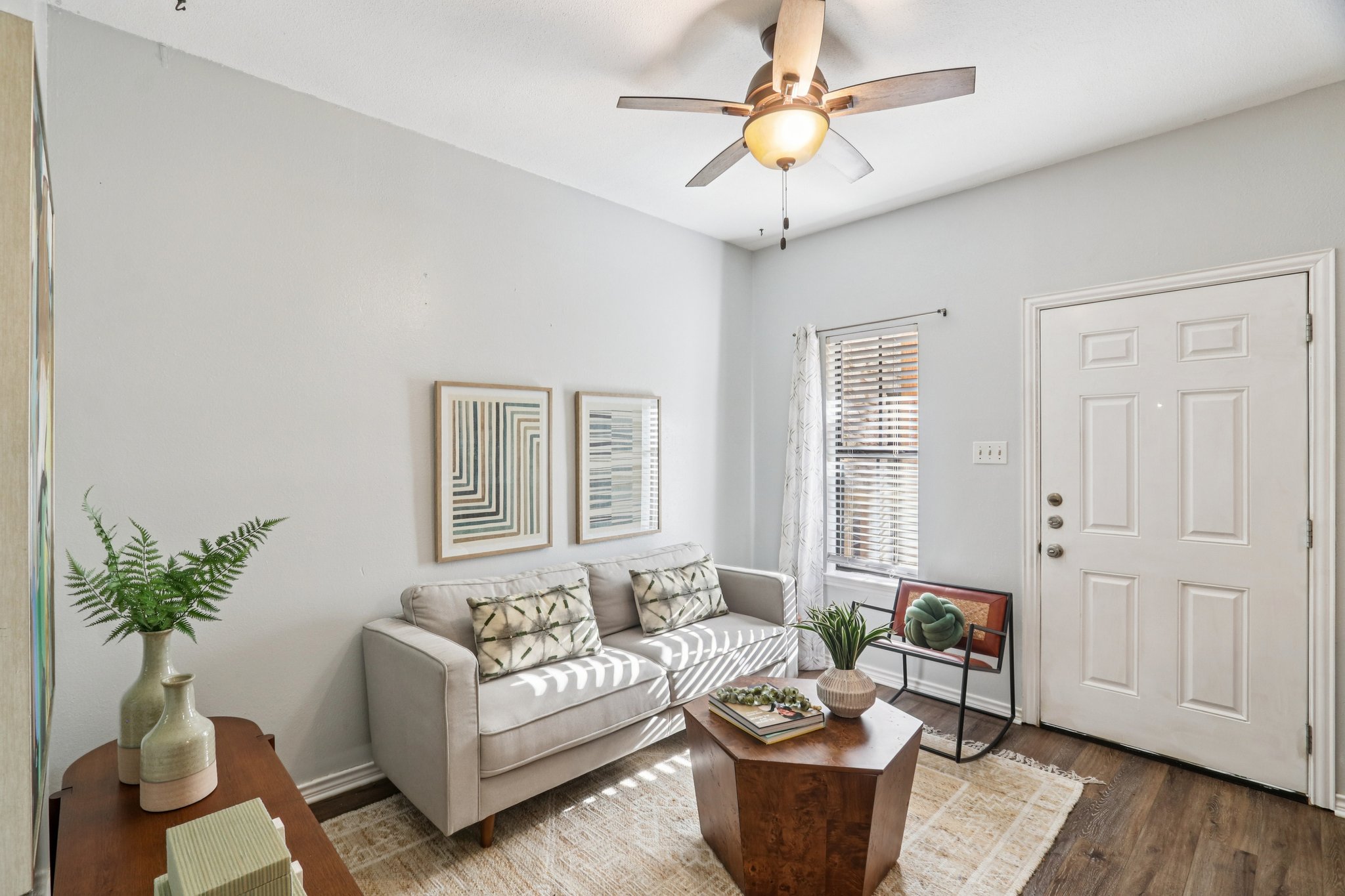 4401 Speedway, Unit 105 Austin, TX 78751 - Photo 15 of 38 Natural textures and warm finishes create a living space that feels cozy, creative, and instantly welcoming.