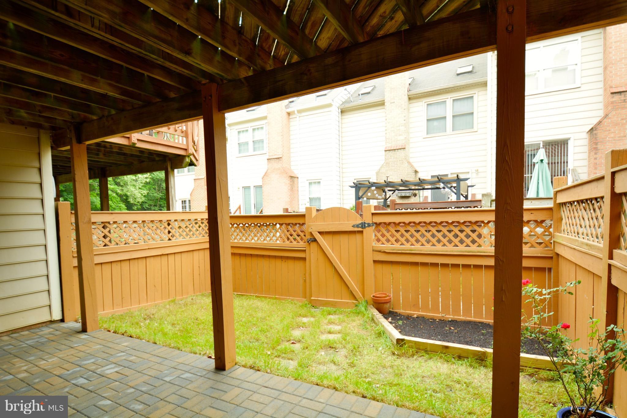 108 West Locust Street Occoquan, VA 22125 - Photo 2 of 30 Brand New Patio in back, fenced yard