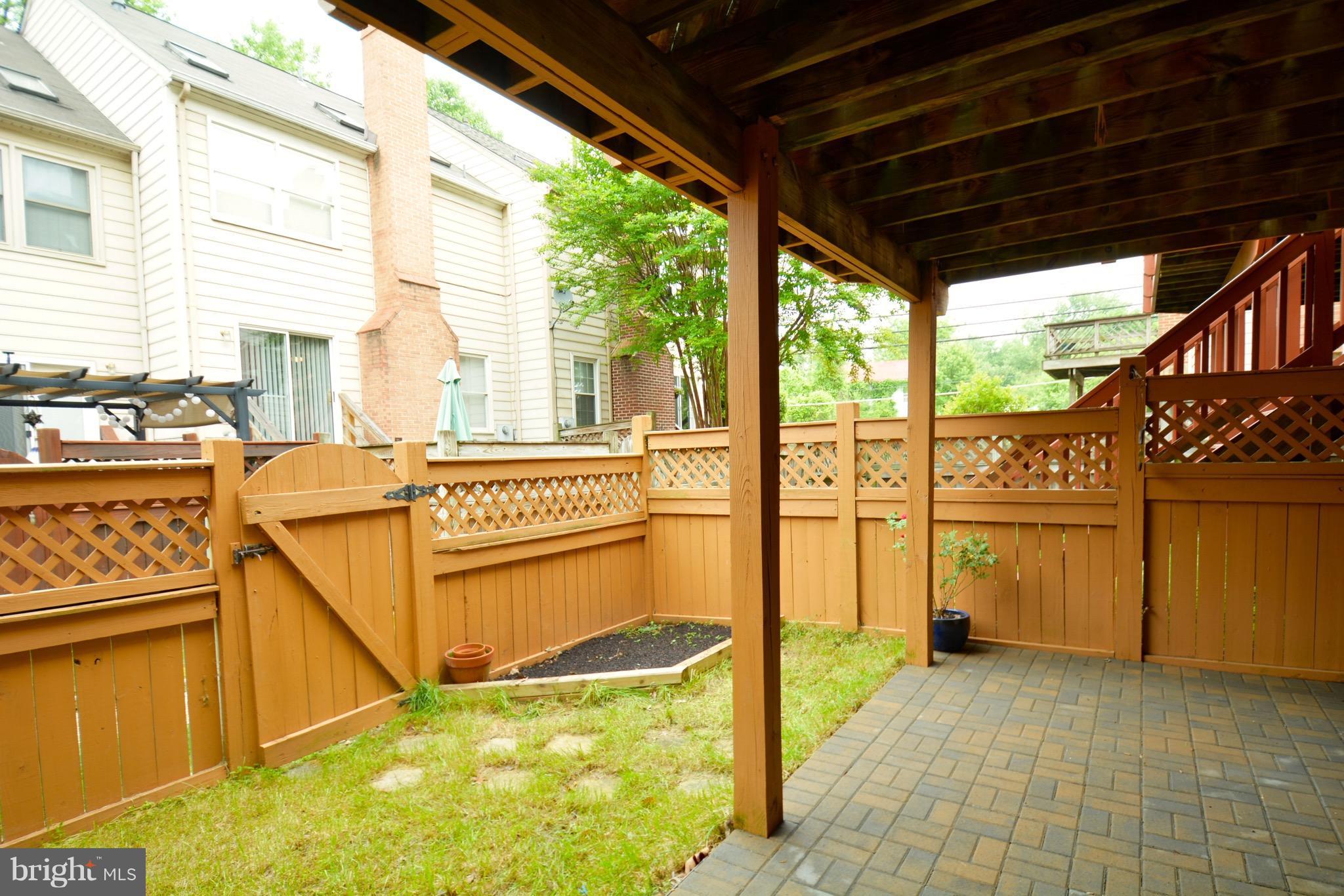 108 West Locust Street Occoquan, VA 22125 - Photo 3 of 30 Brand New Brick patio and fenced yard