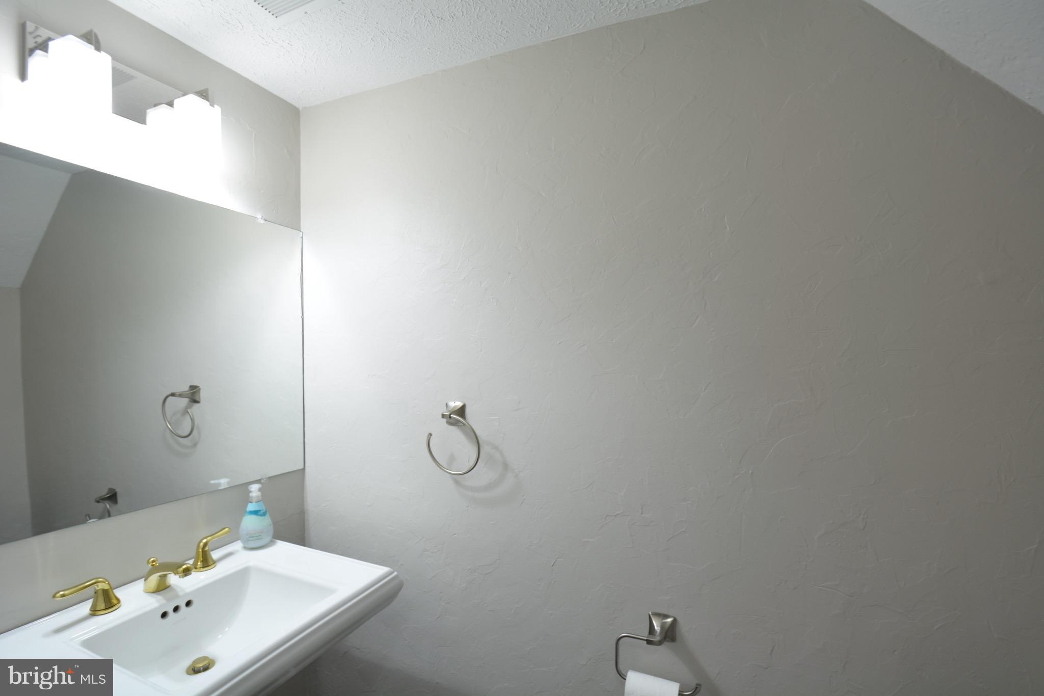 108 West Locust Street Occoquan, VA 22125 - Photo 8 of 30 Half Bath lower level