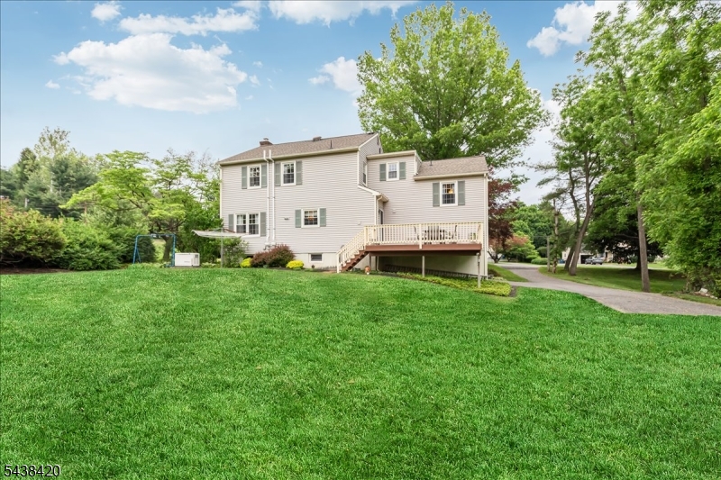 79 Main Street Califon, NJ 07830 - Photo 35 of 50 a front view of house with yard and trees