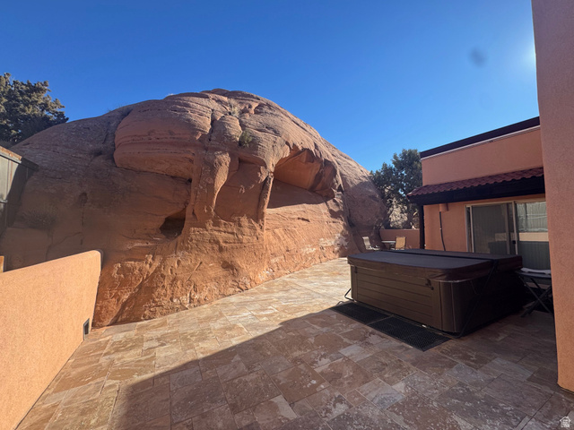 3439 Westwater Road Moab, UT 84532 - Photo 9 of 64 View of patio with a hot tub