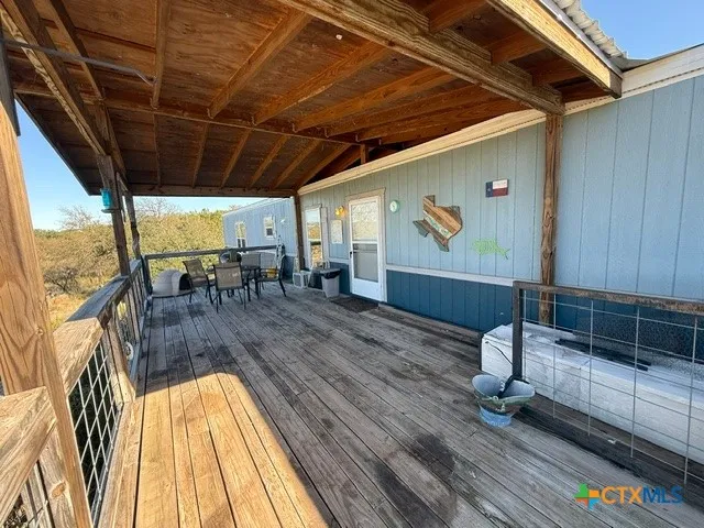 a view of swimming pool with furniture