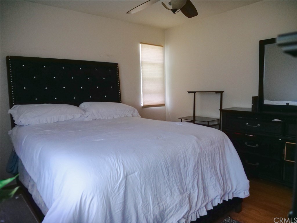 4613 Dunrobin Avenue Lakewood, CA 90713 - Photo 17 of 30 a bedroom with a bed and a dresser