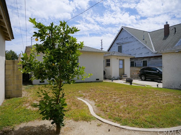 4613 Dunrobin Avenue Lakewood, CA 90713 - Photo 25 of 30 a view of a house with backyard