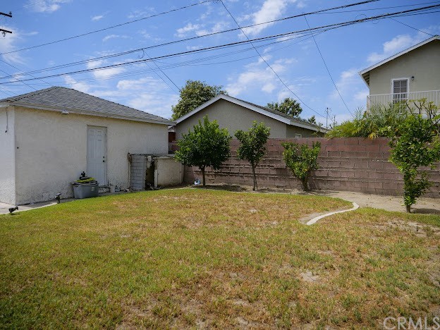 4613 Dunrobin Avenue Lakewood, CA 90713 - Photo 26 of 30 a house view with a backyard space