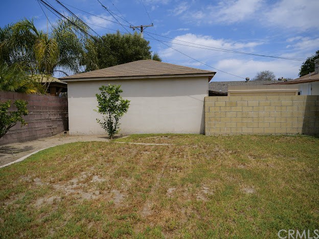 4613 Dunrobin Avenue Lakewood, CA 90713 - Photo 27 of 30 front view of a house with a yard