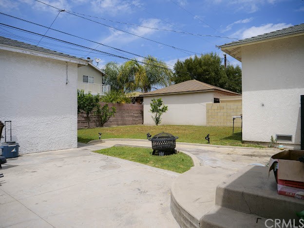 4613 Dunrobin Avenue Lakewood, CA 90713 - Photo 30 of 30 a house view with a backyard space