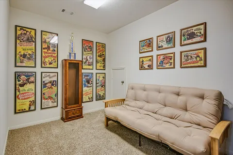 a living room with furniture and window