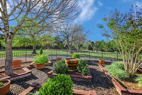 a garden view with a seating space