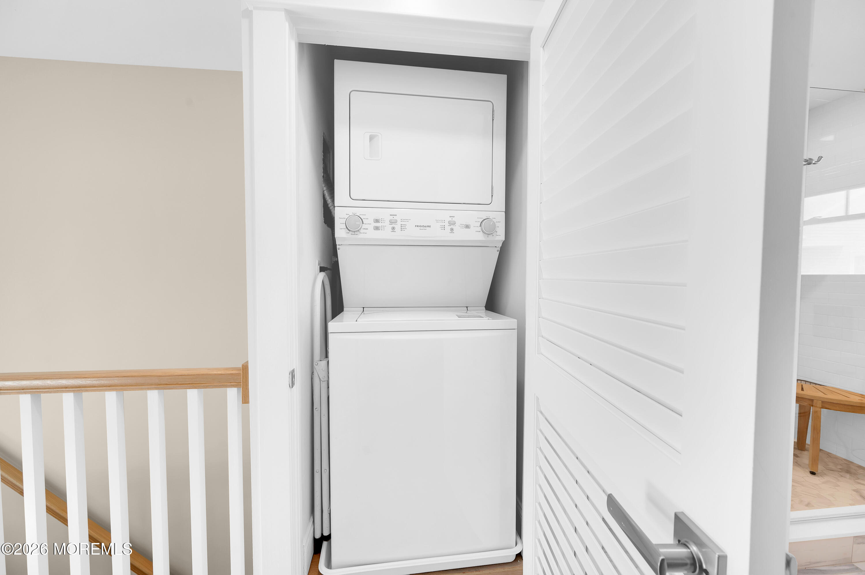 27 Shell Road, Unit 143 Mantoloking, NJ 08738 - Photo 19 of 23 a utility room with dryer and washer
