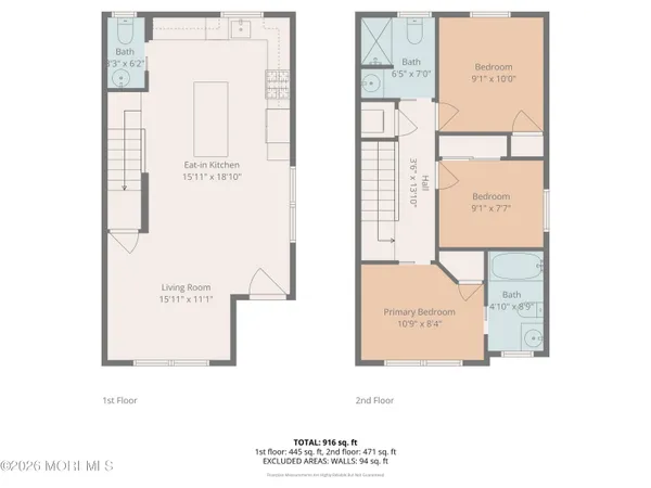 a front view of a residential apartment building with a yard