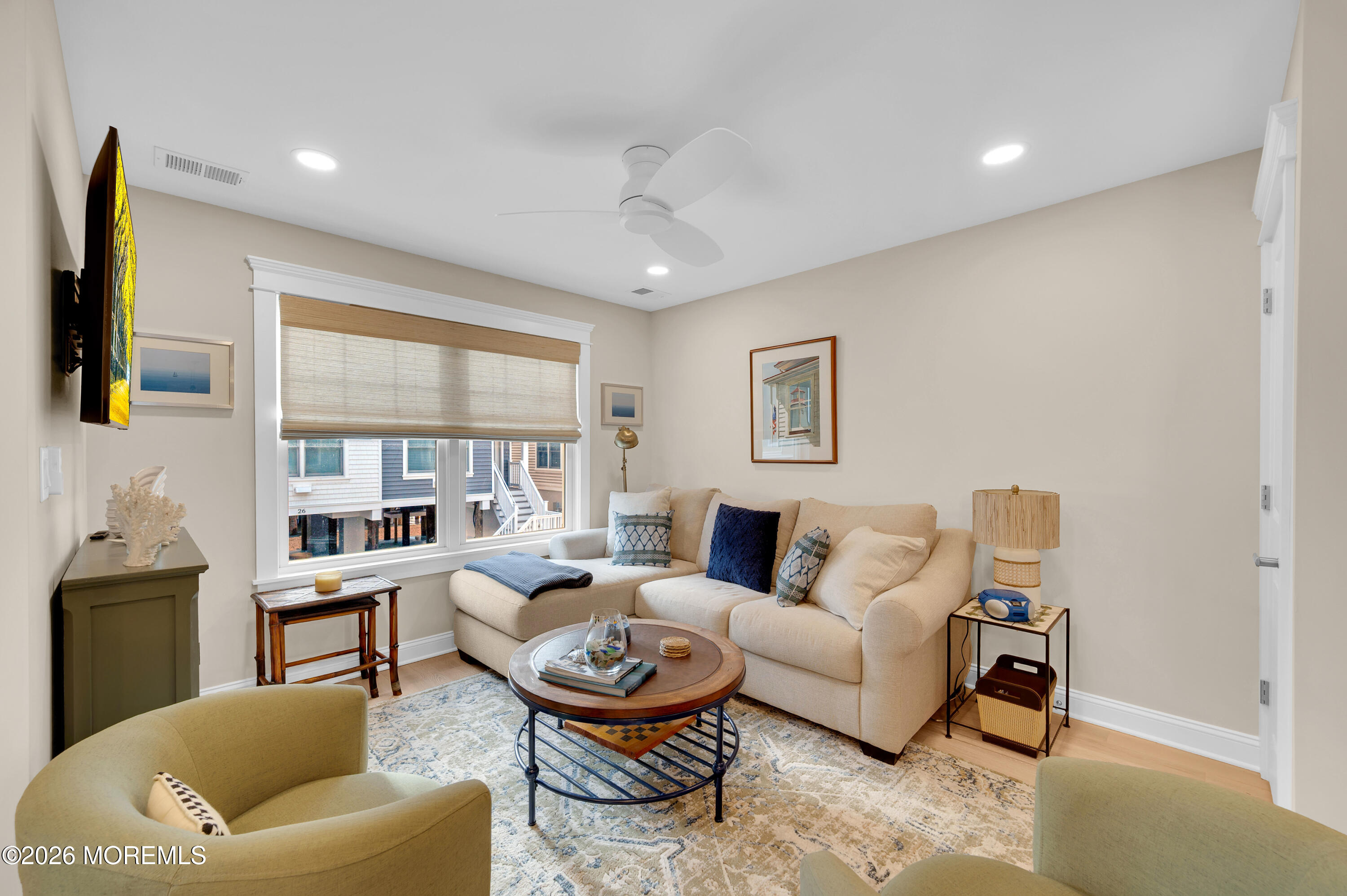 27 Shell Road, Unit 143 Mantoloking, NJ 08738 - Photo 5 of 23 a living room with furniture and a large window