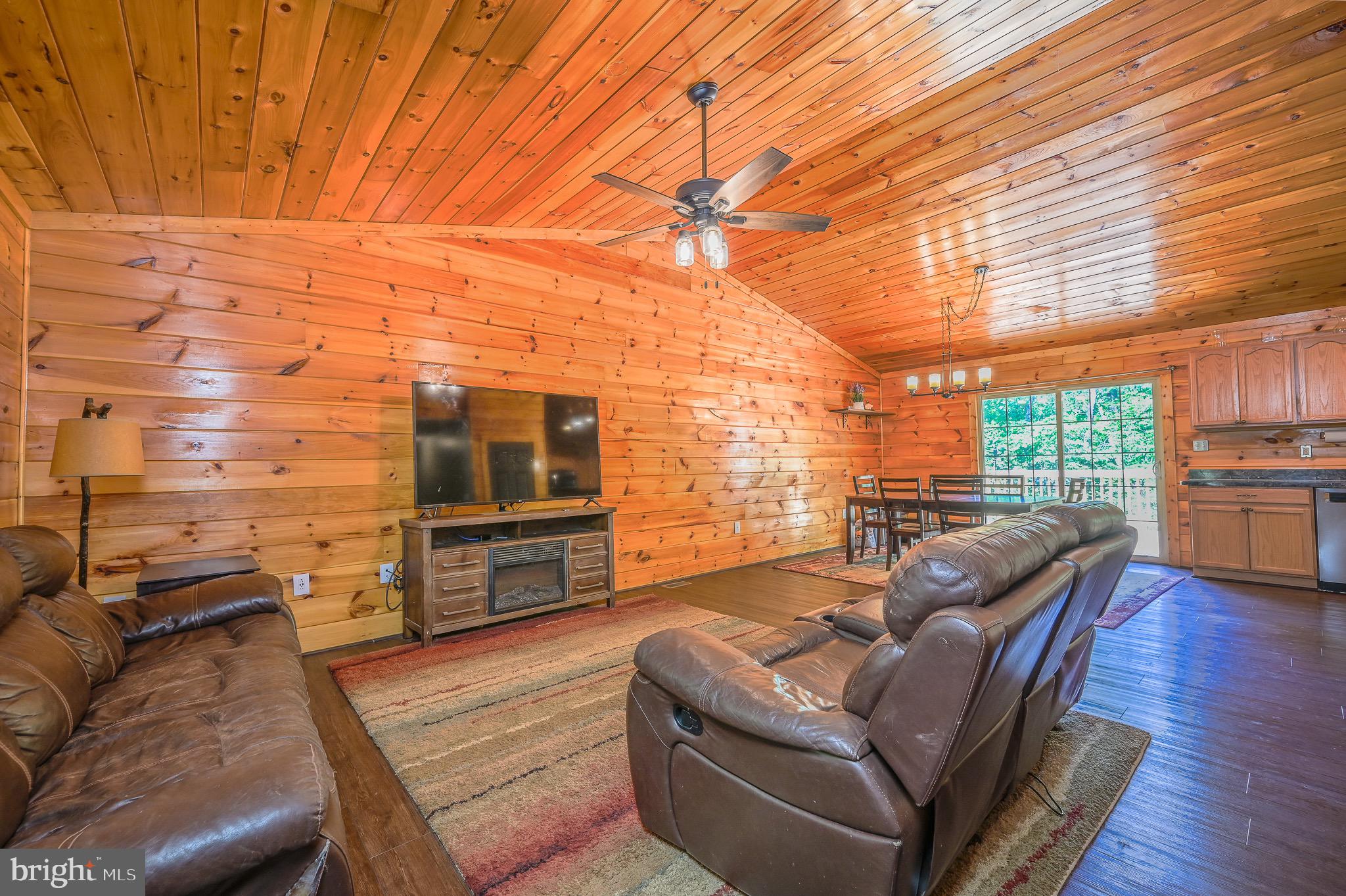 185 Buck Road Linden, VA 22642 - Photo 12 of 44 Family room with wood ceiling