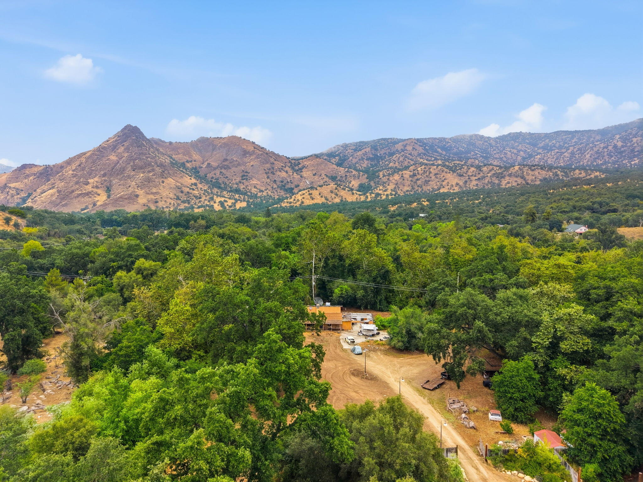 44065 South Fork Drive Three Rivers, CA 93271 - Photo 26 of 33 a view of a lush green hillside and a mountain