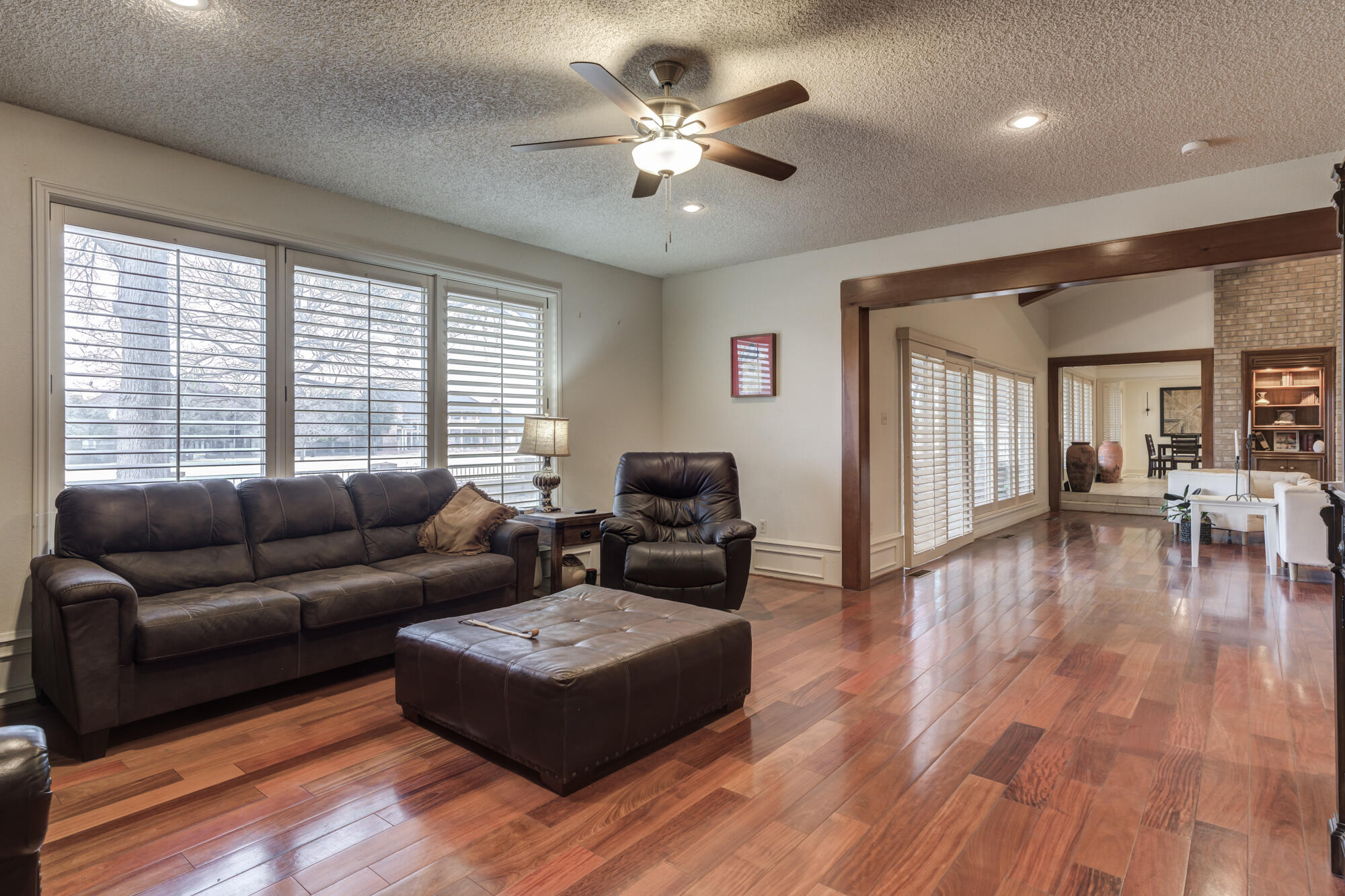 4405 89th Street Lubbock, TX 79424 - Photo 14 of 71 a living room with furniture and a large window