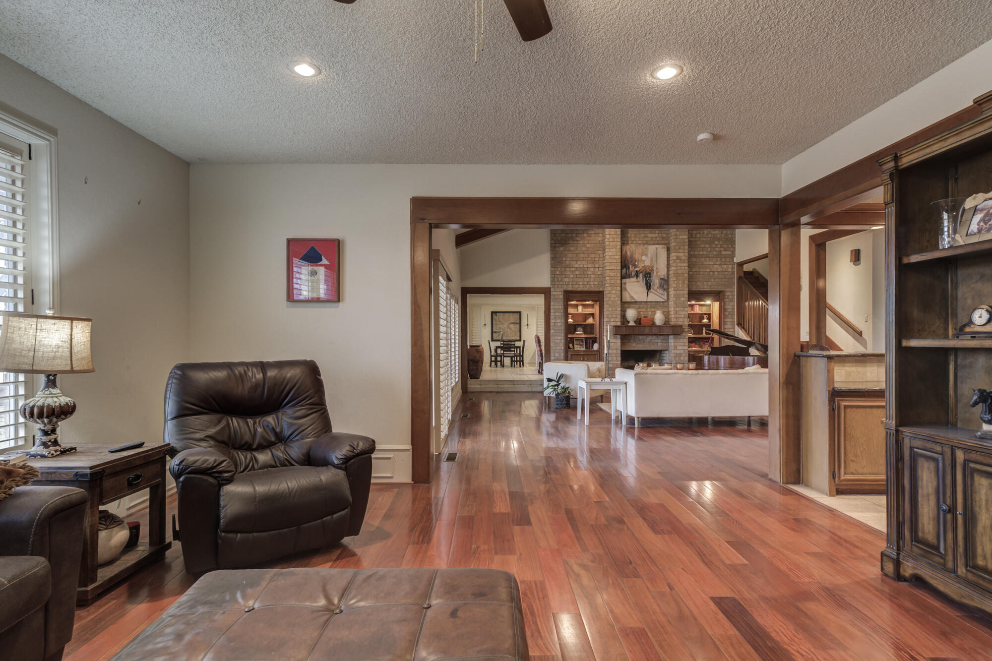 4405 89th Street Lubbock, TX 79424 - Photo 15 of 71 a living room with furniture and a flat screen tv