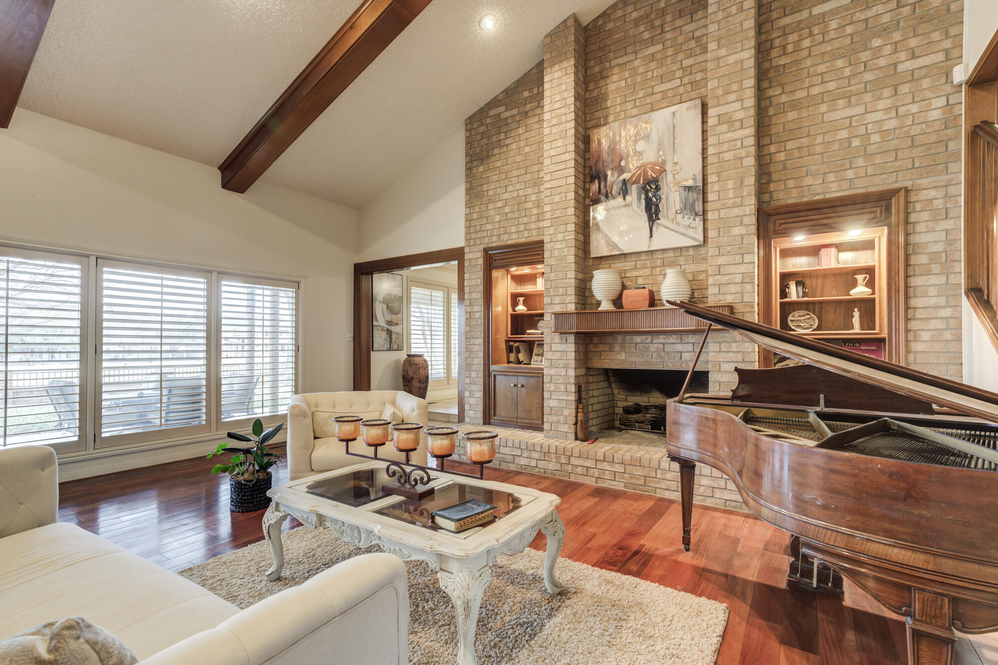 4405 89th Street Lubbock, TX 79424 - Photo 22 of 71 a living room with fireplace furniture and a large window