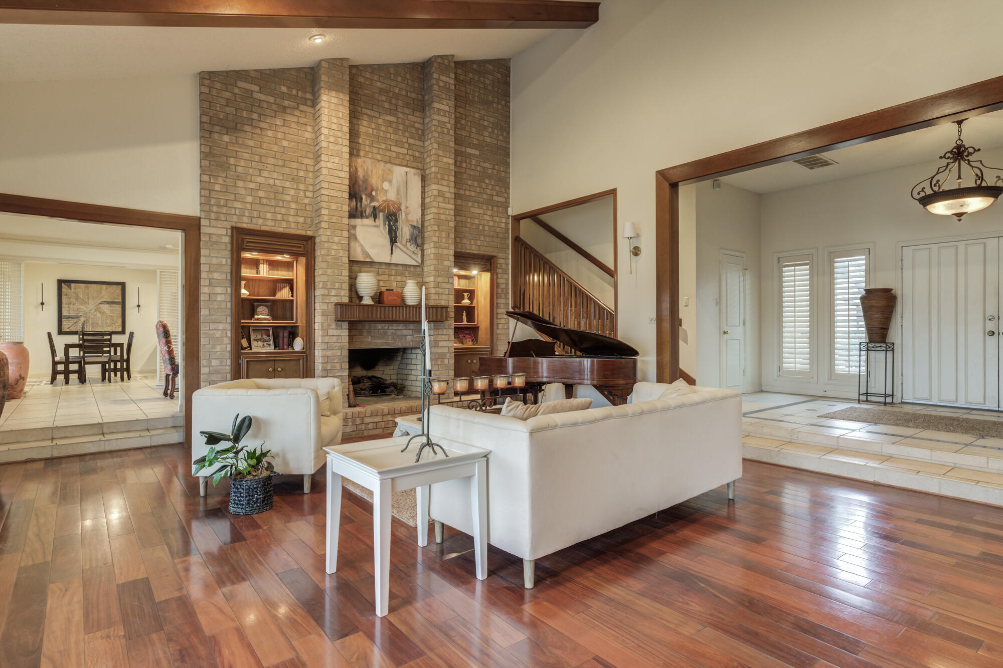 4405 89th Street Lubbock, TX 79424 - Photo 25 of 71 a living room with fireplace furniture and a wooden floor