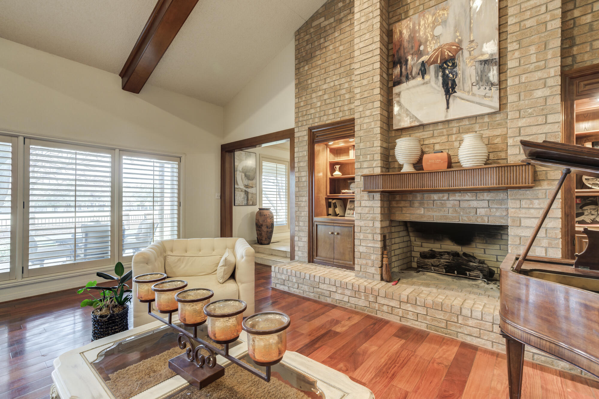 4405 89th Street Lubbock, TX 79424 - Photo 26 of 71 a living room with furniture and a fireplace