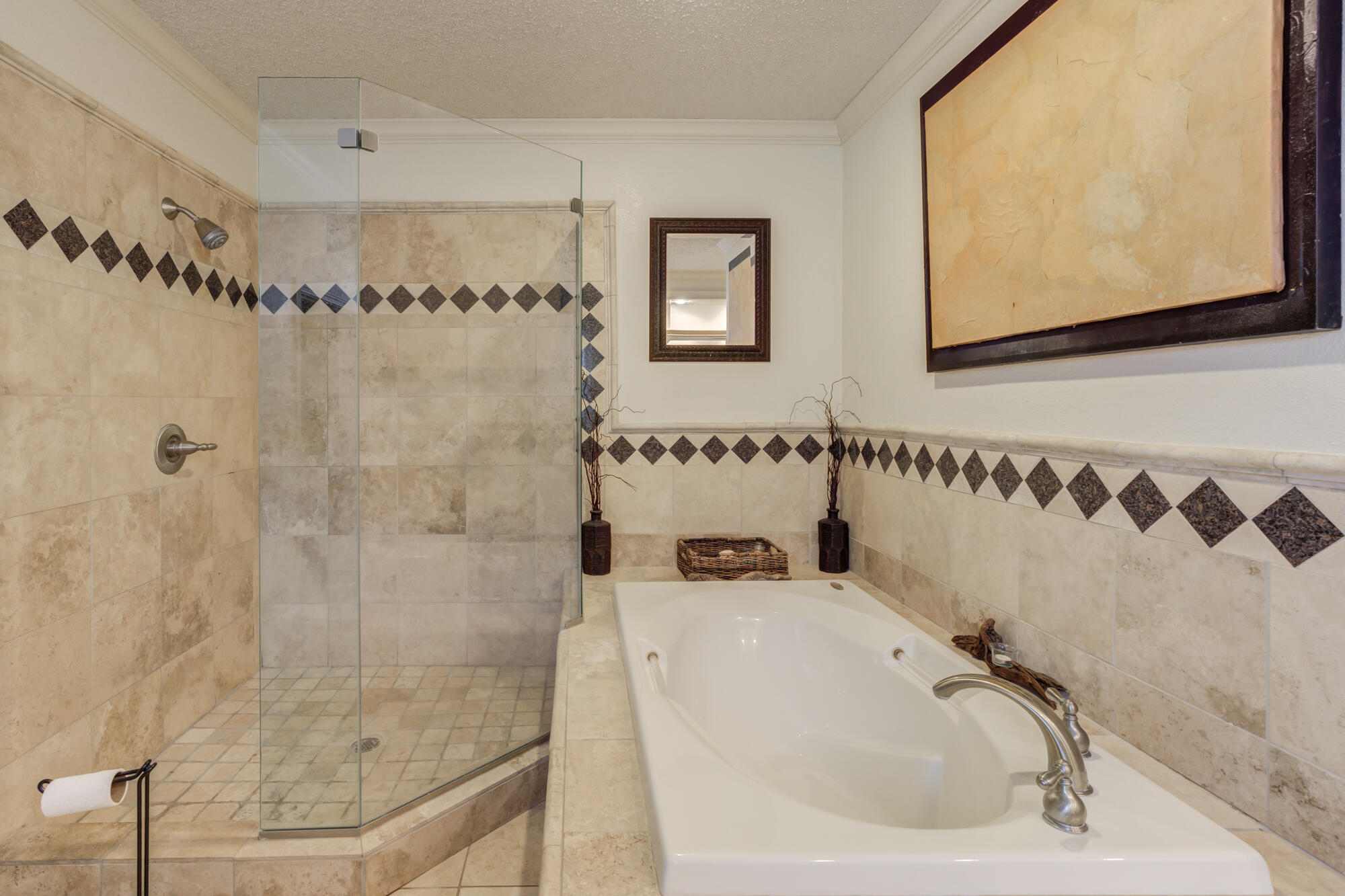 4405 89th Street Lubbock, TX 79424 - Photo 63 of 71 a bathroom with a bathtub and a shower