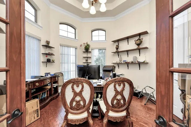 a view of a storage and utility room with racks on the wall
