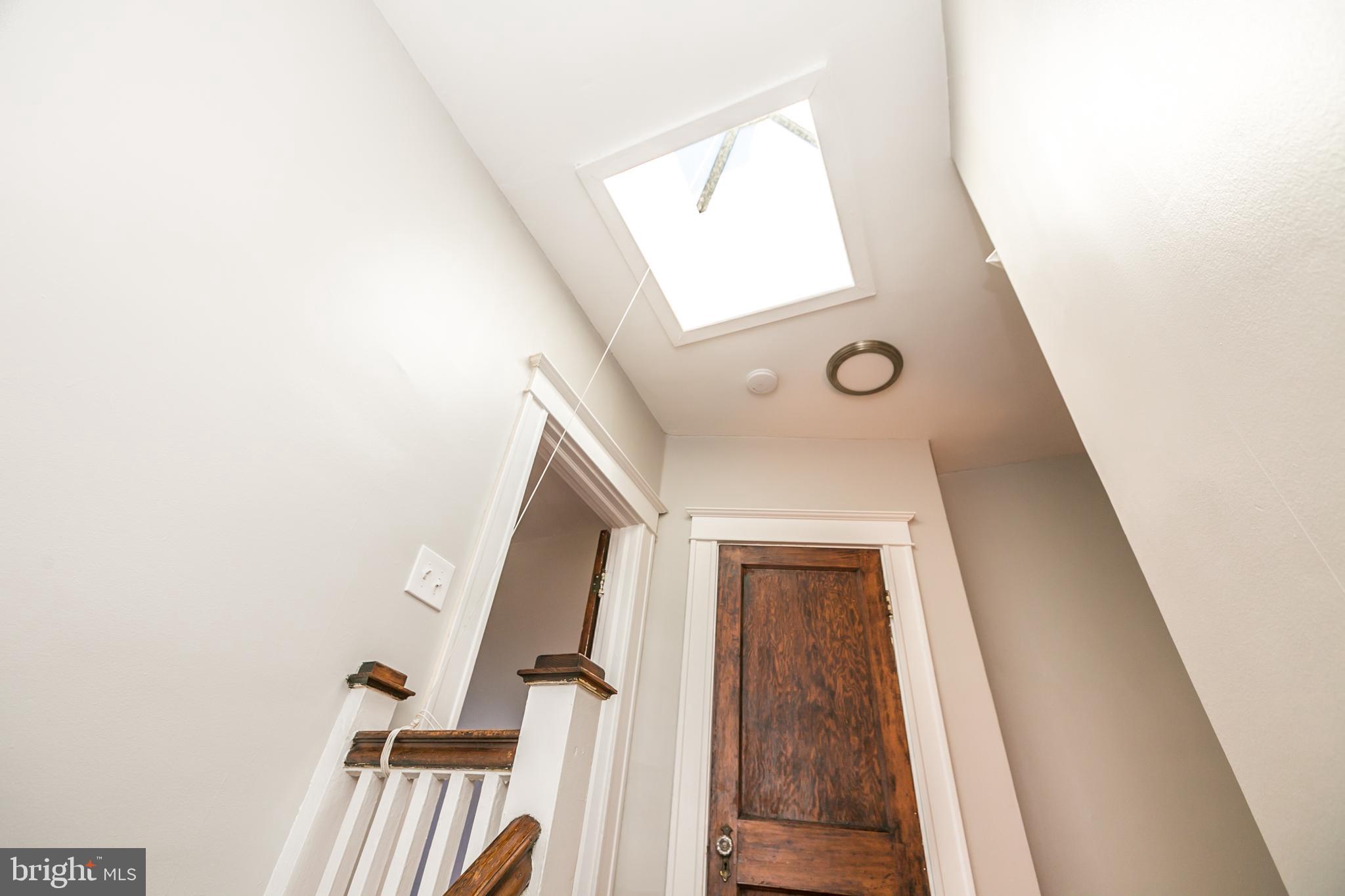 321 East 29th Street Baltimore, MD 21218 - Photo 15 of 34 Skylight at top of second floor