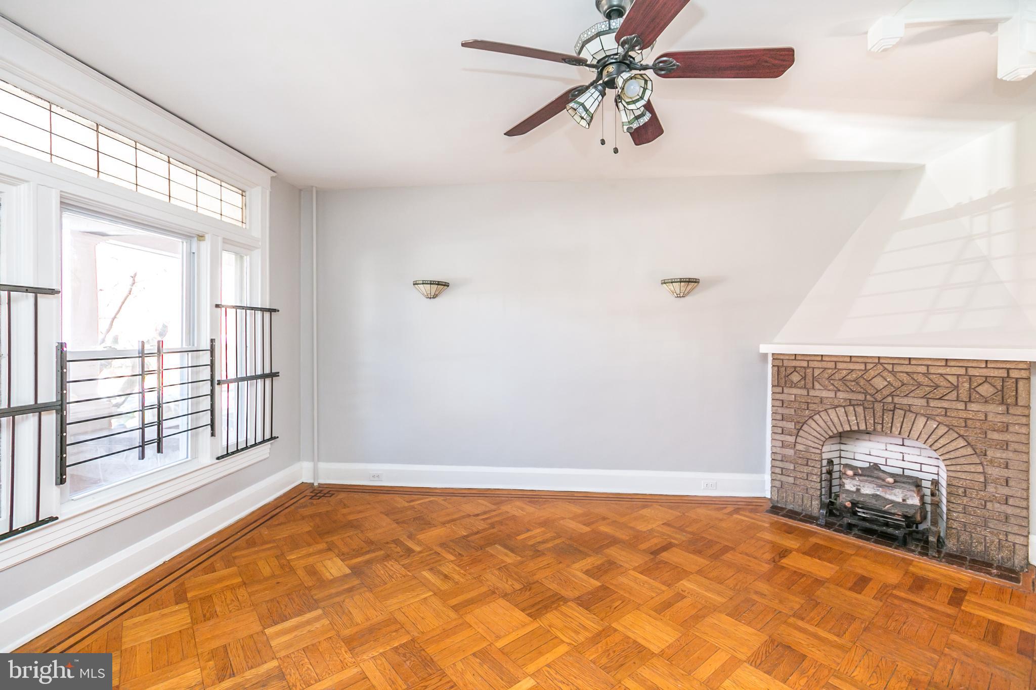 321 East 29th Street Baltimore, MD 21218 - Photo 3 of 34 Living room with decorative FP