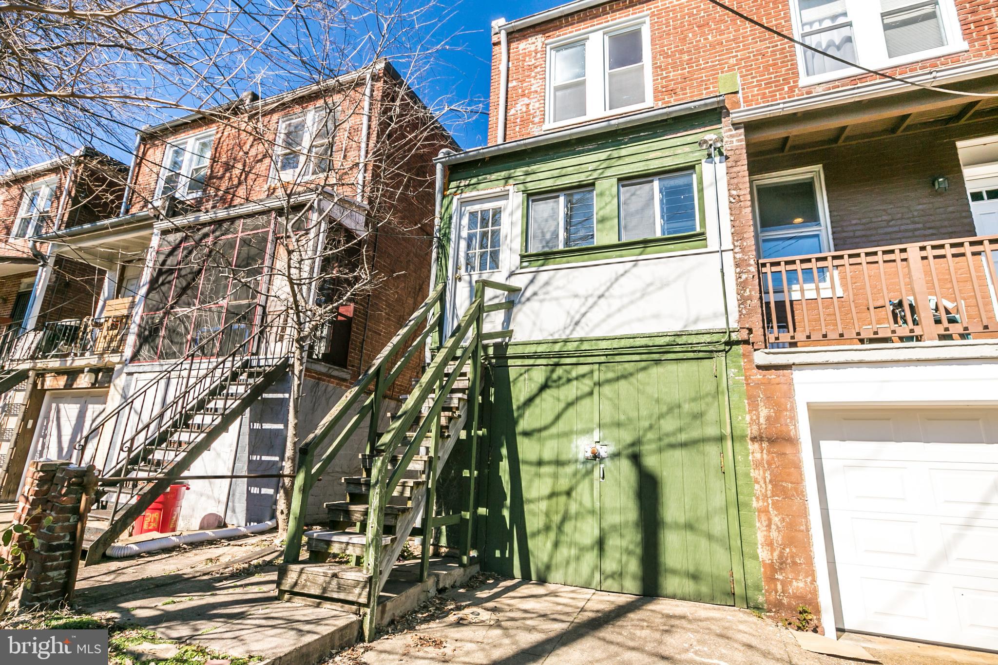 321 East 29th Street Baltimore, MD 21218 - Photo 32 of 34 Rear with parking pad and garage