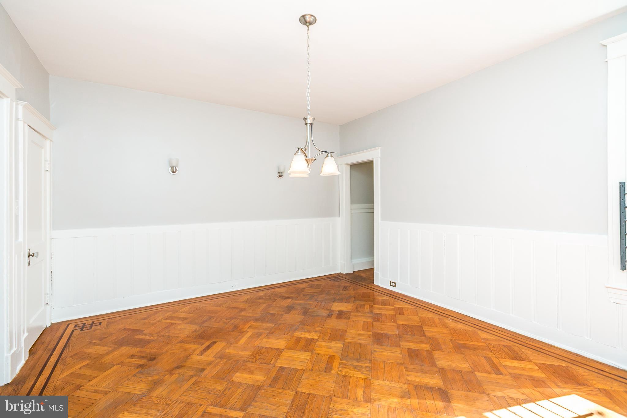 321 East 29th Street Baltimore, MD 21218 - Photo 7 of 34 Dining room with wainscoating