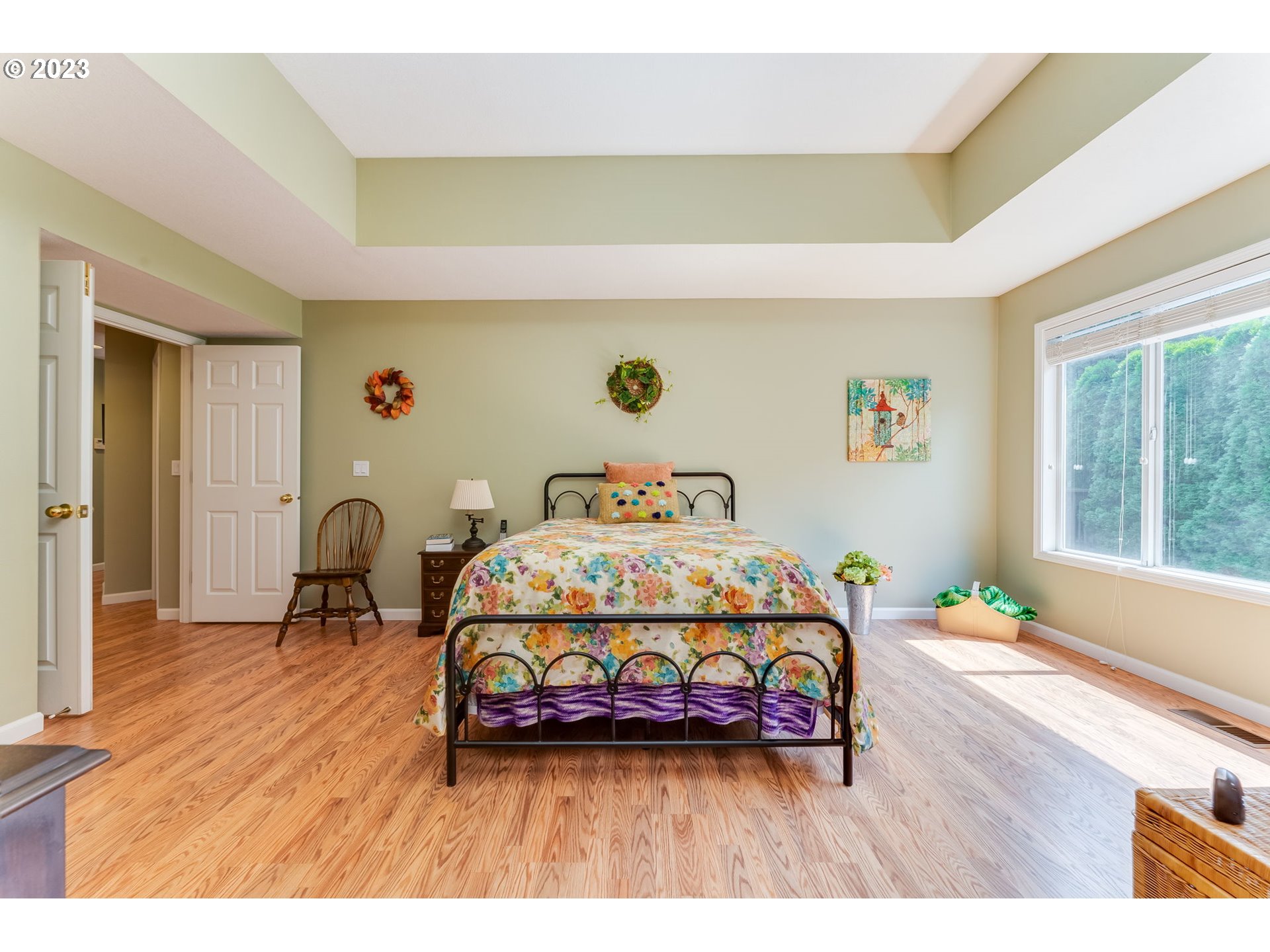 14029 Southeast 35th Loop Vancouver, WA 98683 - Photo 22 of 48 a bedroom with a bed and wooden floor