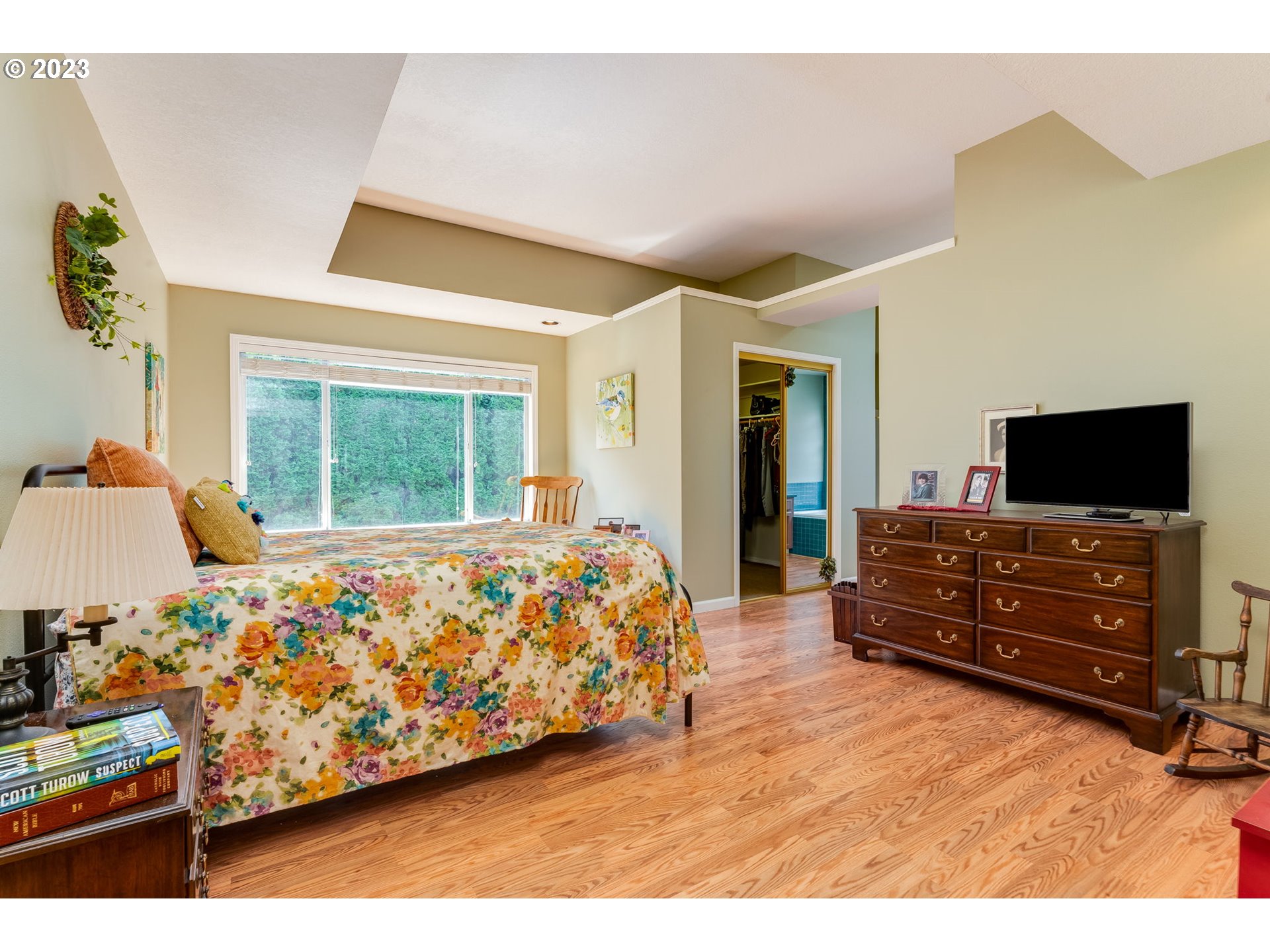 14029 Southeast 35th Loop Vancouver, WA 98683 - Photo 23 of 48 a bedroom with a bed and a flat screen tv