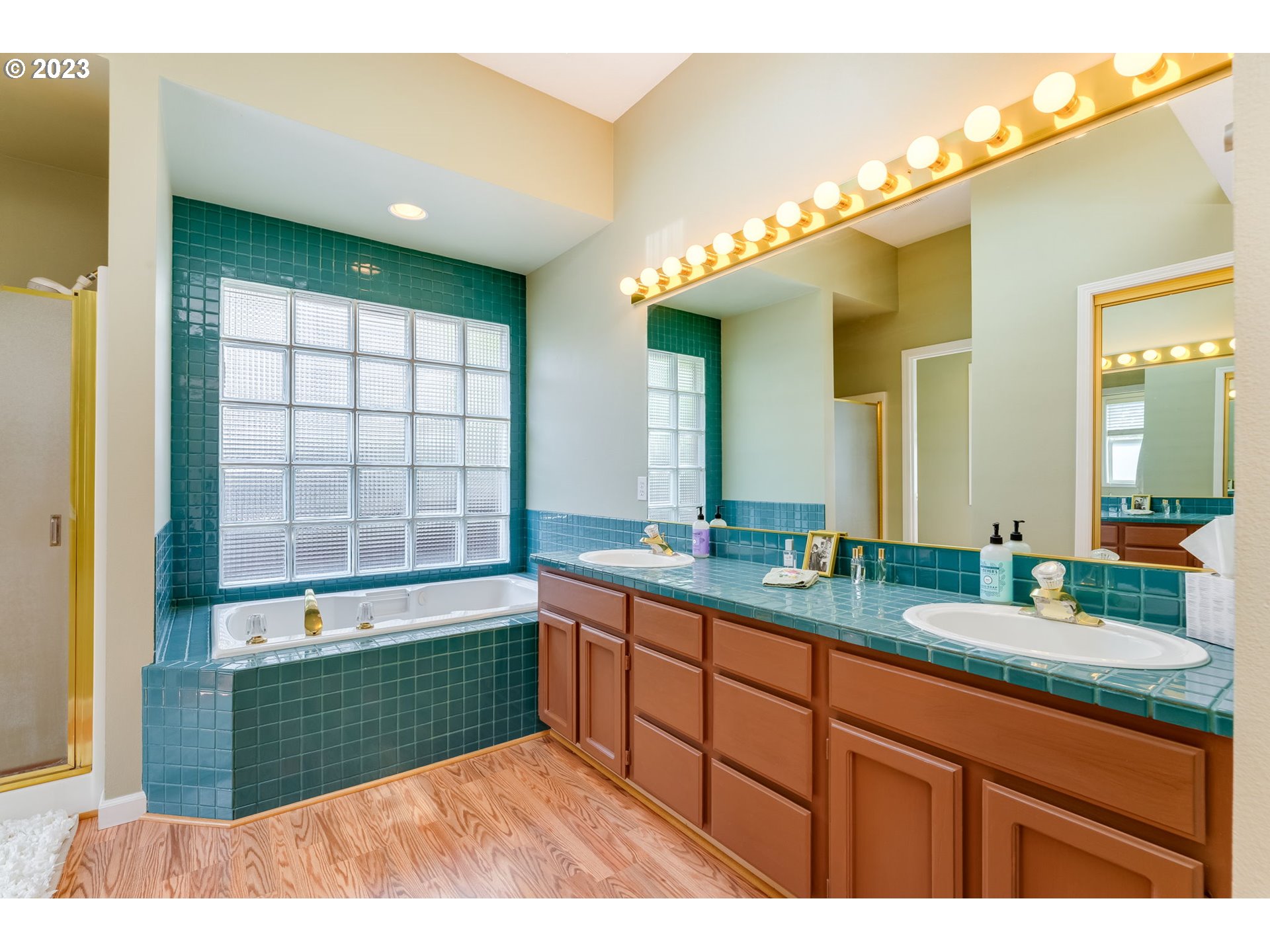 14029 Southeast 35th Loop Vancouver, WA 98683 - Photo 26 of 48 a bathroom with a sink double vanity and a mirror