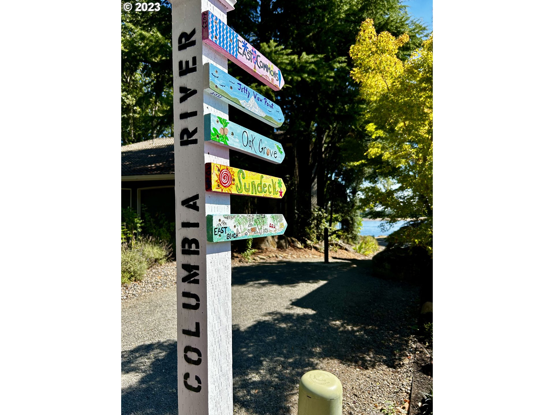 14029 Southeast 35th Loop Vancouver, WA 98683 - Photo 40 of 48 a street sign on a pole next to a road