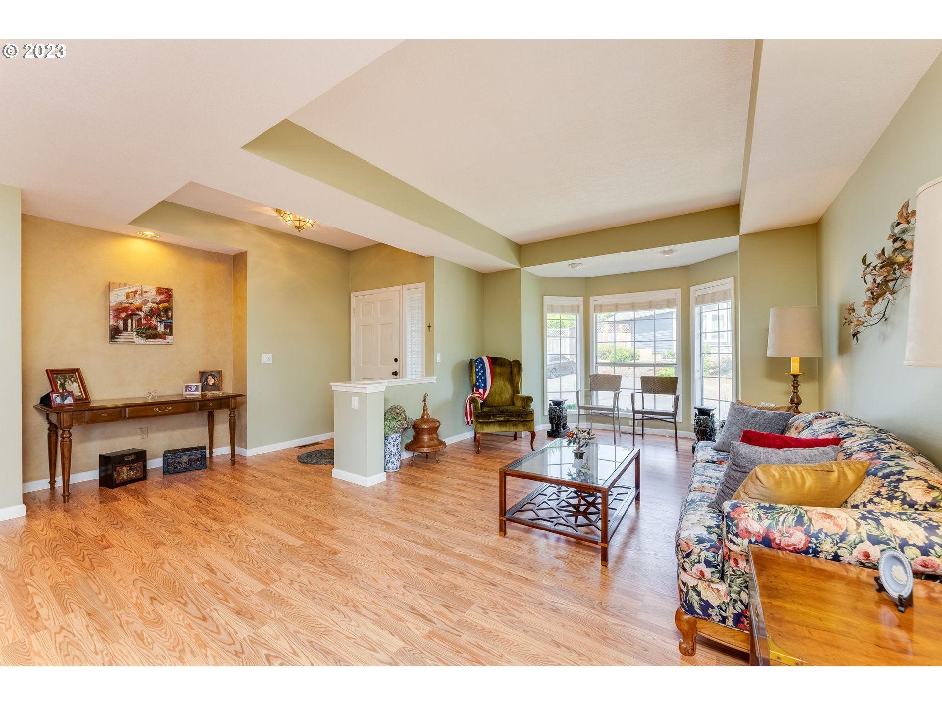 14029 Southeast 35th Loop Vancouver, WA 98683 - Photo 6 of 48 a living room with furniture and a flat screen tv