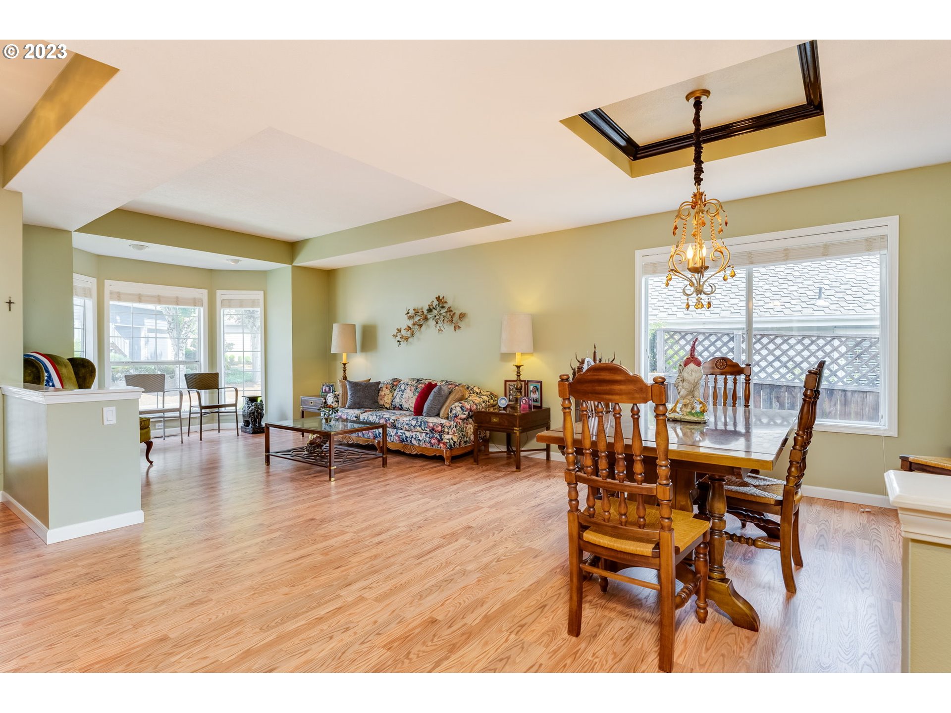 14029 Southeast 35th Loop Vancouver, WA 98683 - Photo 8 of 48 a view of a dining room with furniture and wooden floor