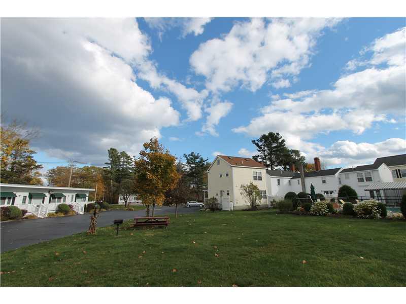 76 Post Road, Unit 9M Wells, ME 04090 - Photo 9 of 17 Yard/Garden. Large, inviting lawns...