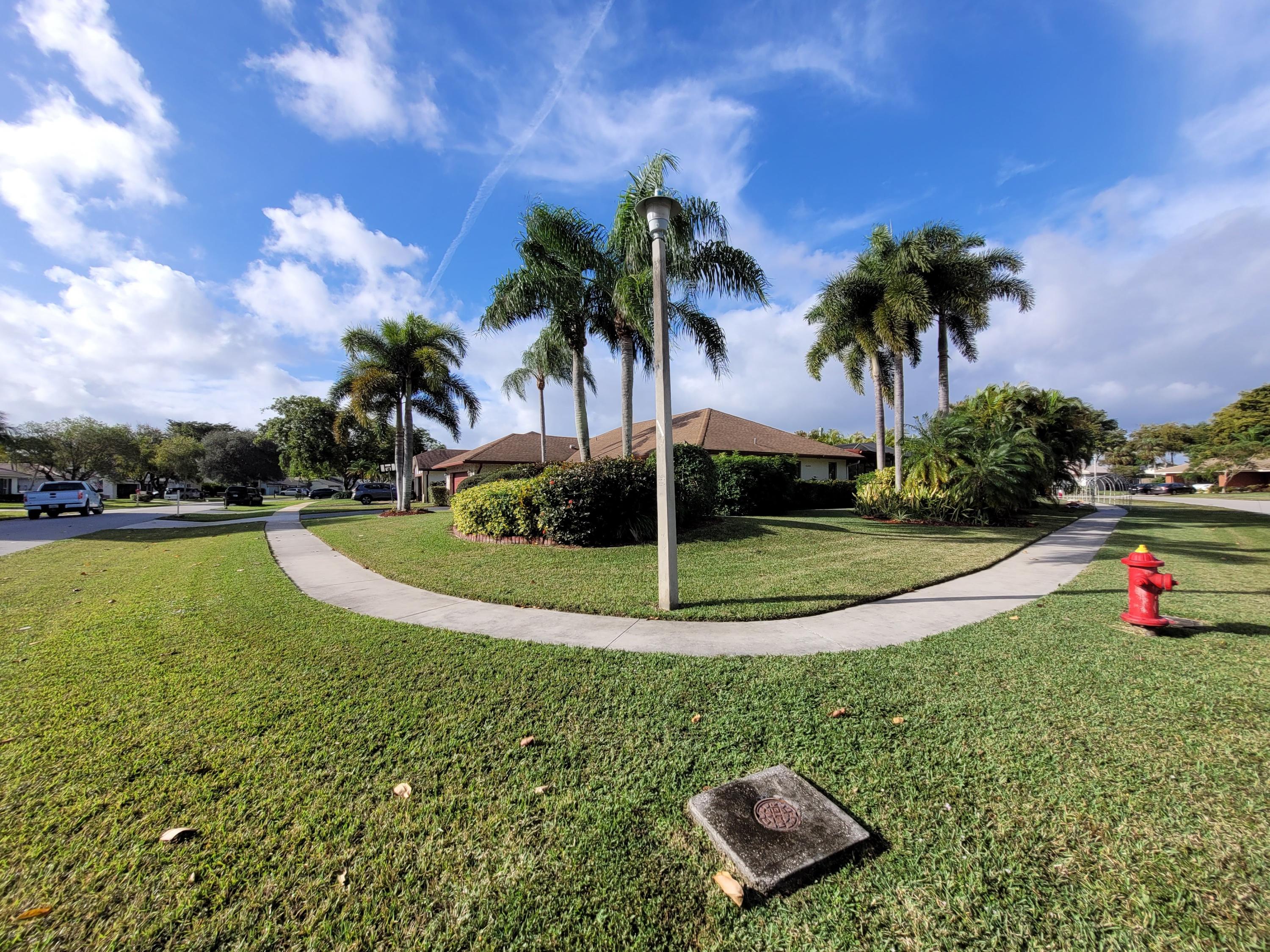 21173 Raindance Lane Boca Raton, FL 33428 - Photo 6 of 48 OVERALL WIDE ANGLE VIEW OF CORNER