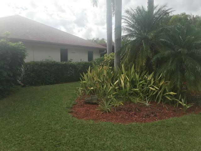 21173 Raindance Lane Boca Raton, FL 33428 - Photo 8 of 48 SIDEYARD (CORNER LANDSCAPE)