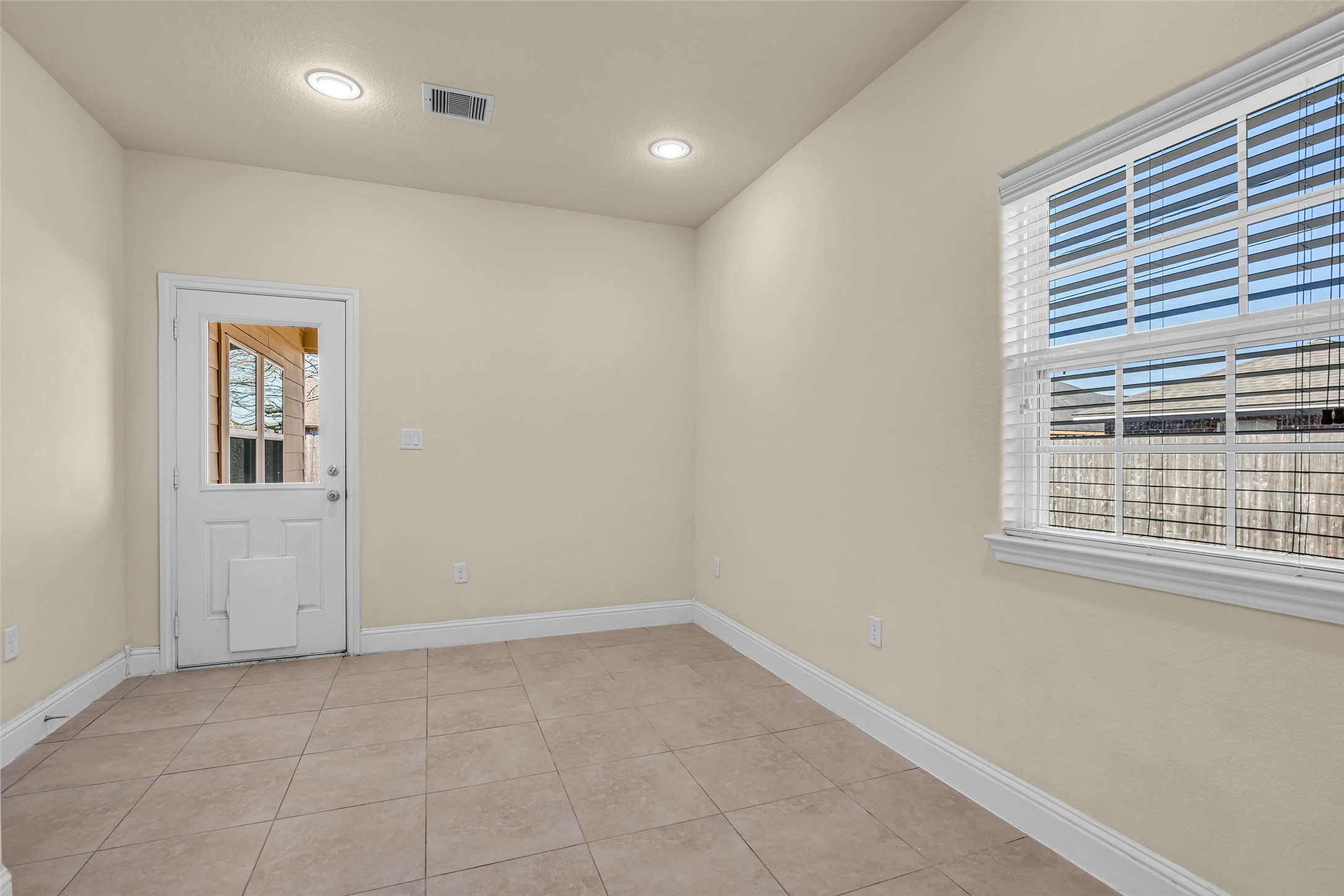 323 Texas Avenue Arcola, TX 77583 - Photo 15 of 27 a view of an empty room with a window