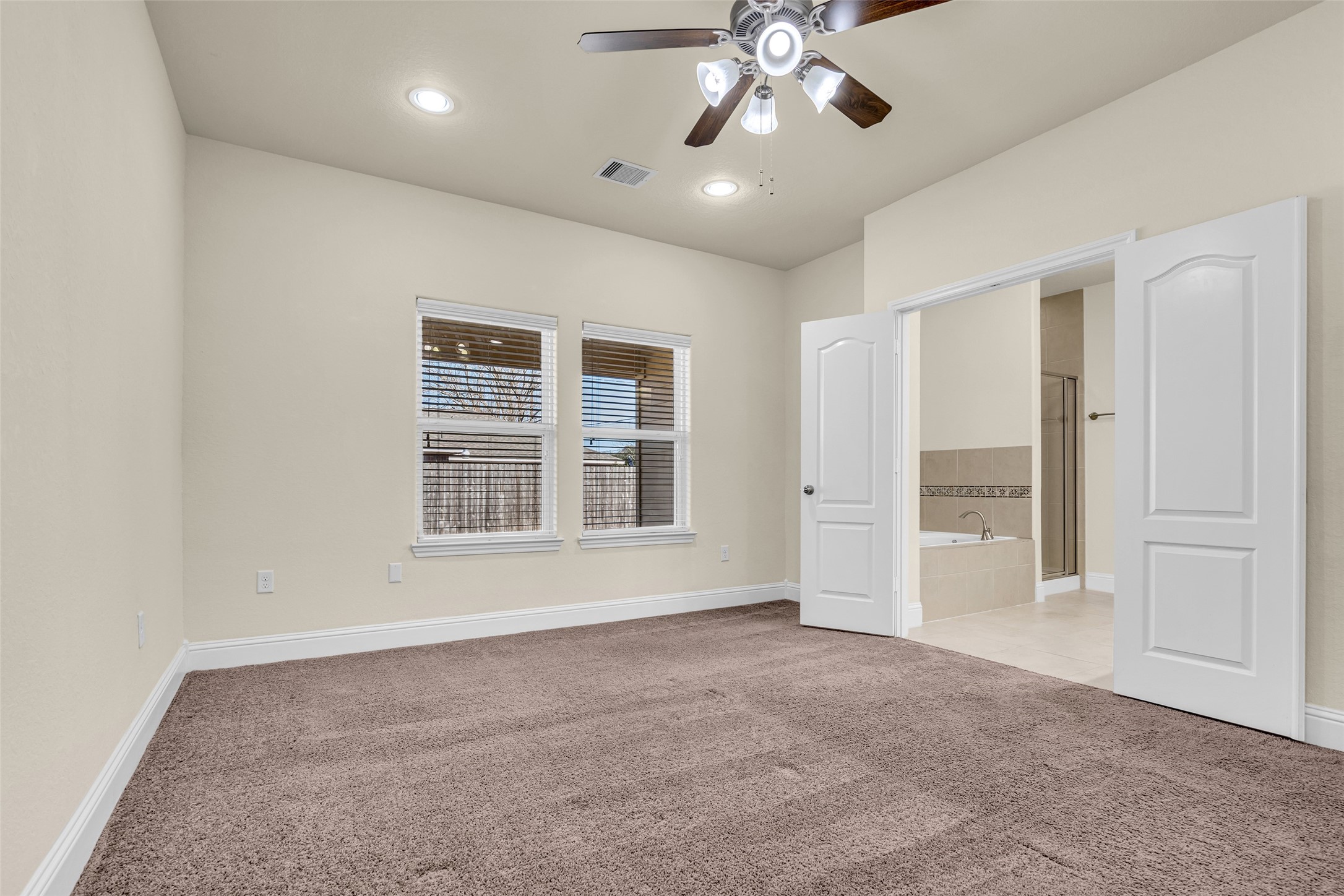 323 Texas Avenue Arcola, TX 77583 - Photo 17 of 27 a view of an empty room with a window