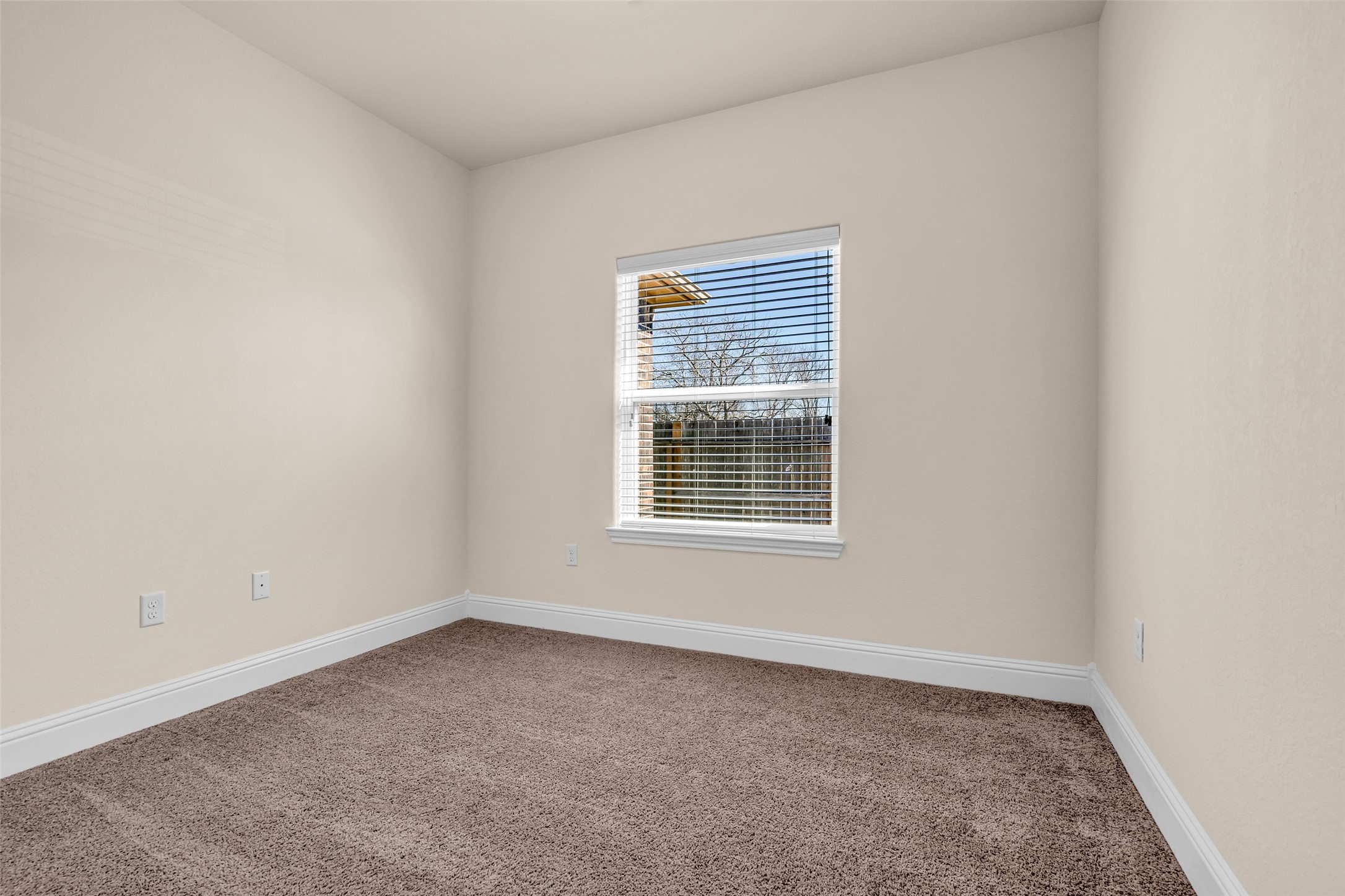 323 Texas Avenue Arcola, TX 77583 - Photo 23 of 27 an empty room with a window