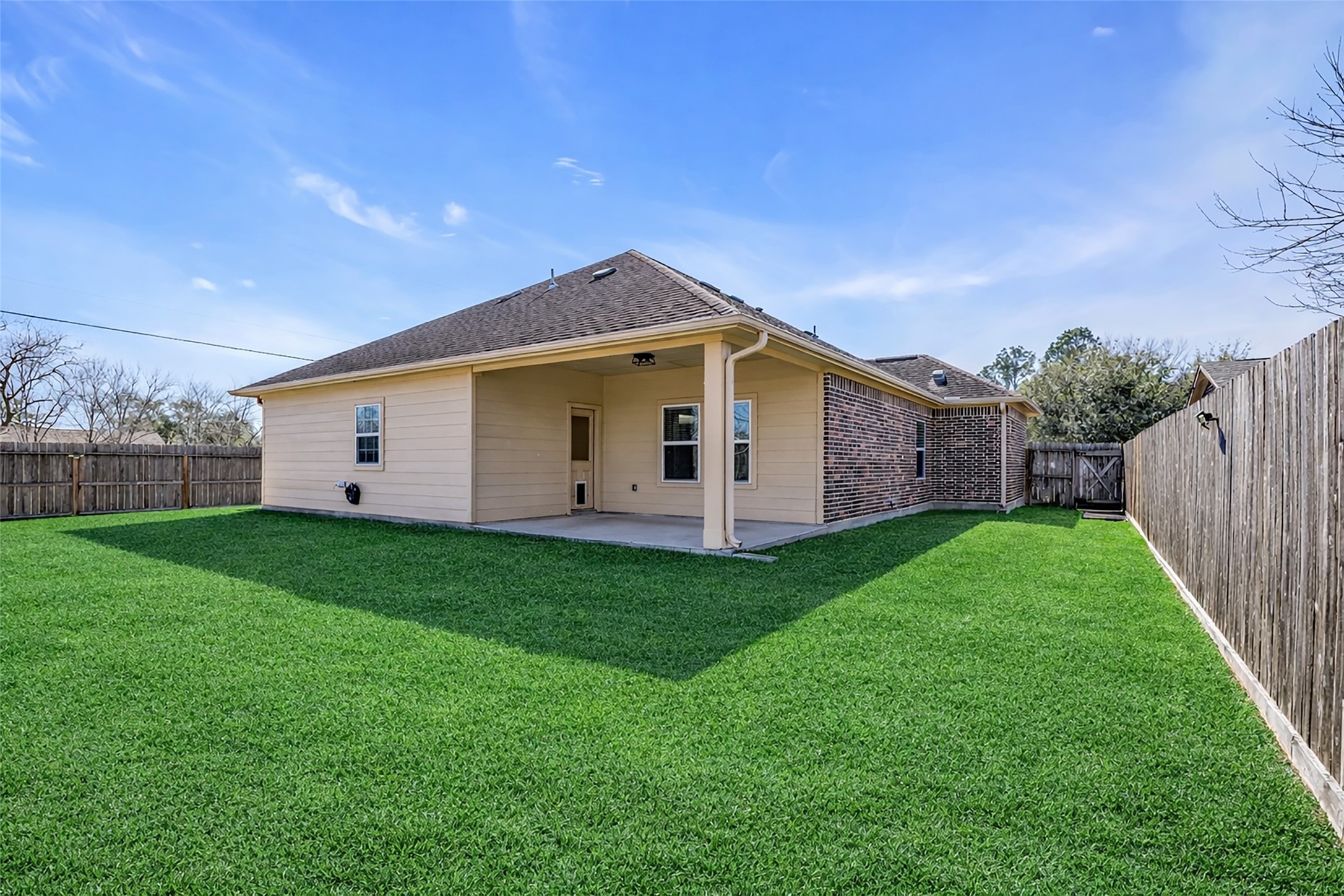323 Texas Avenue Arcola, TX 77583 - Photo 27 of 27 a view of a backyard with garden